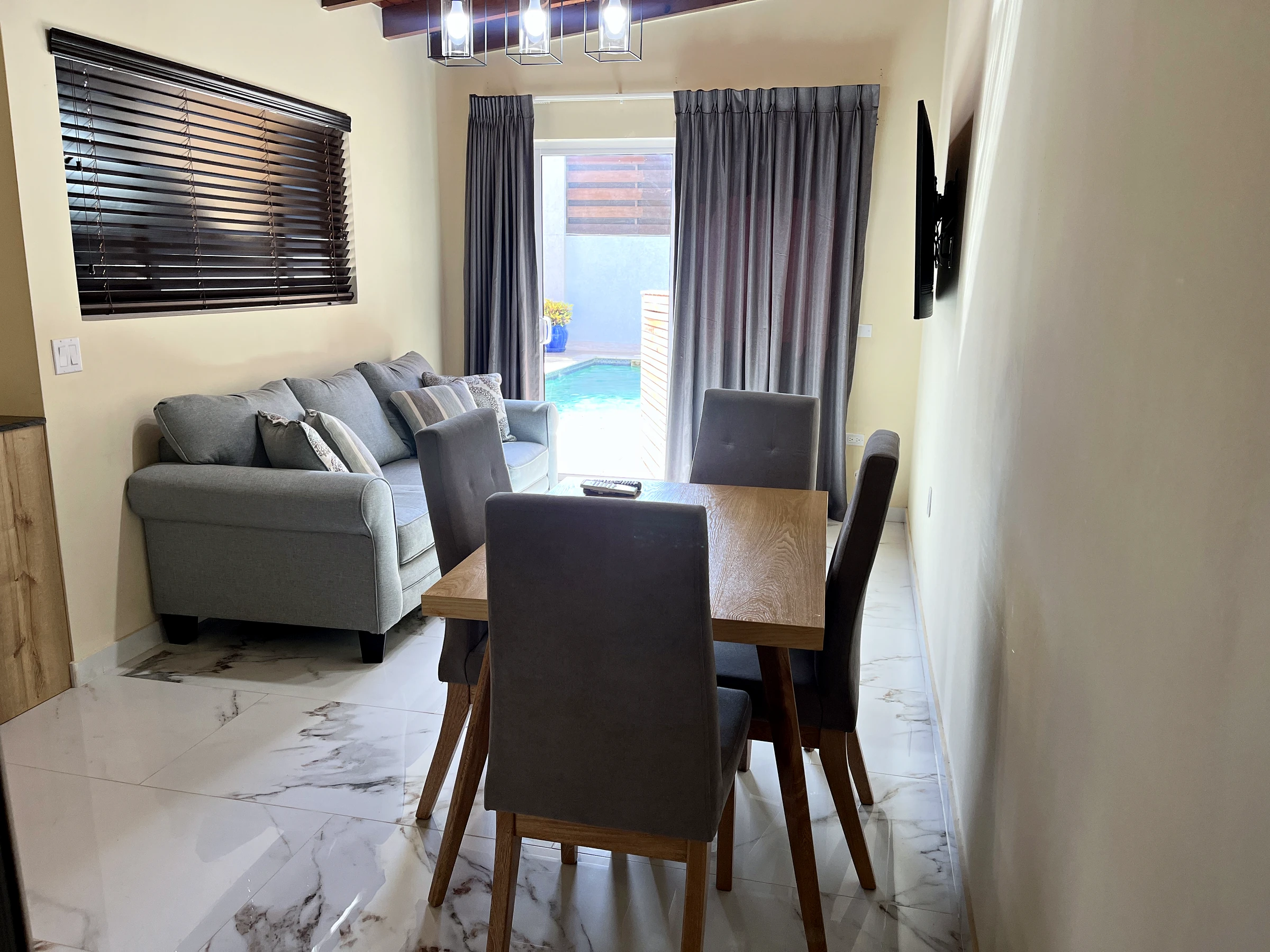 The living and dining room — Family Paradise Suite