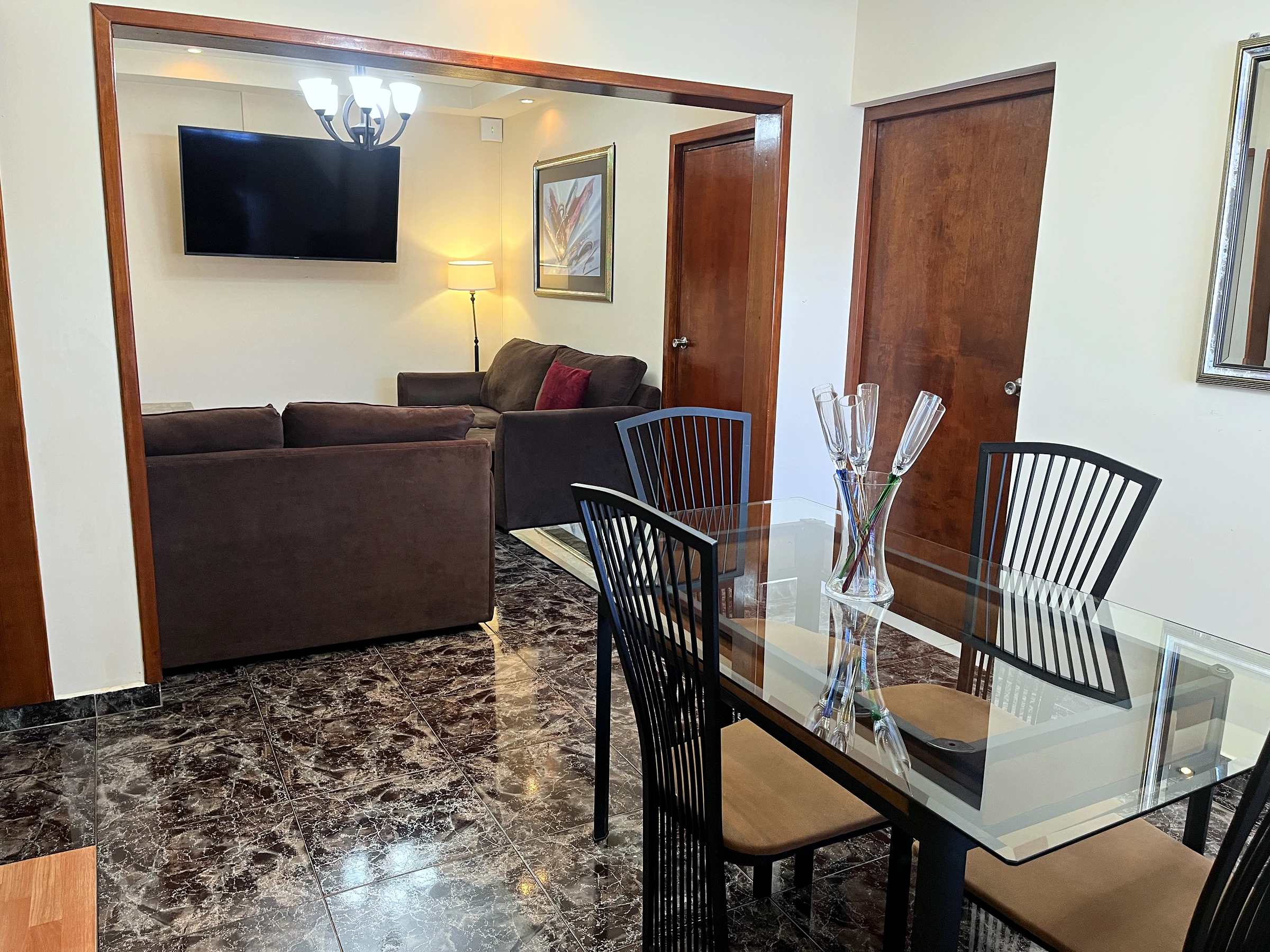 The living and dining room — Deluxe One Bedroom Apartment